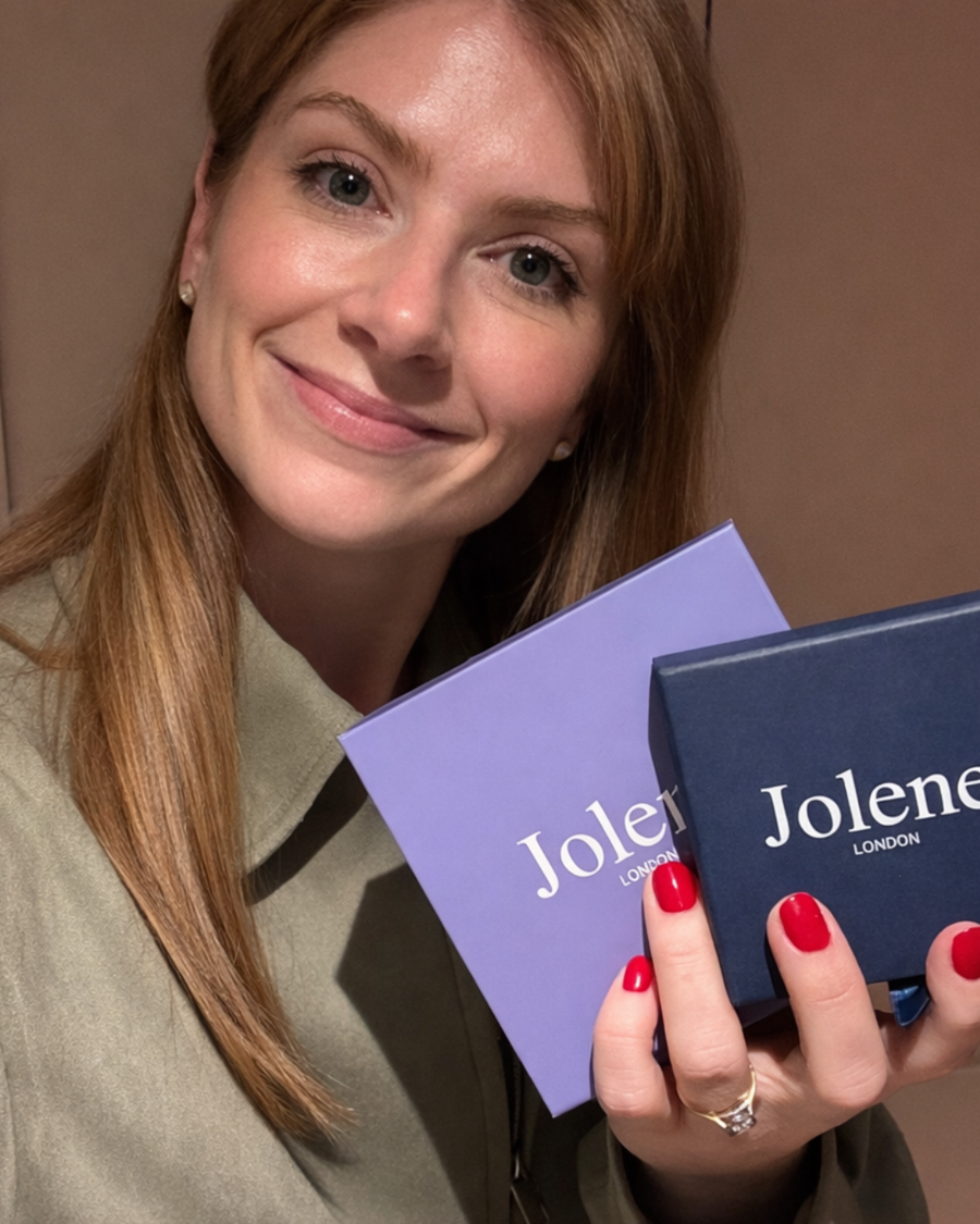 Woman holding two Jolene boxes